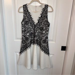 Flattering White Dress with Black Lace